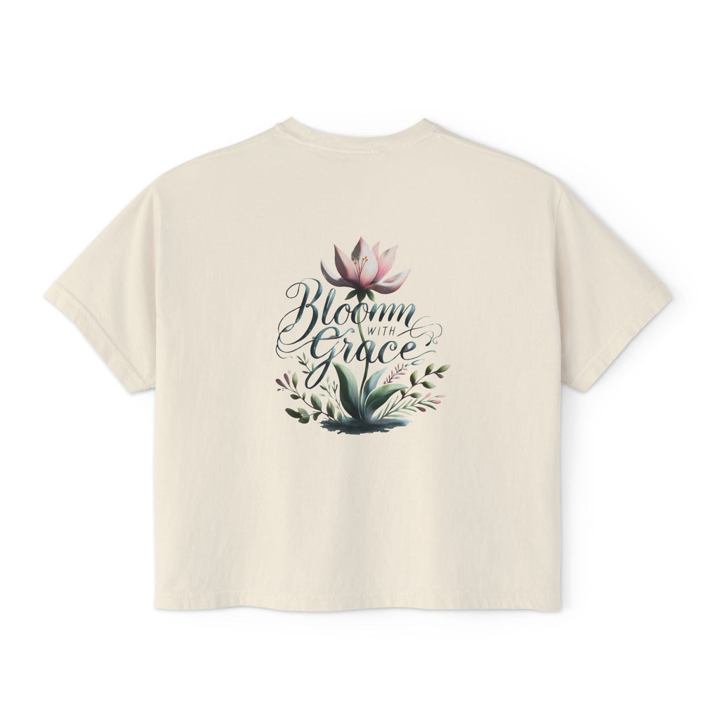 Womens boxy T-shirt with "Bloom with Grace" floral graphic, casual summer top.