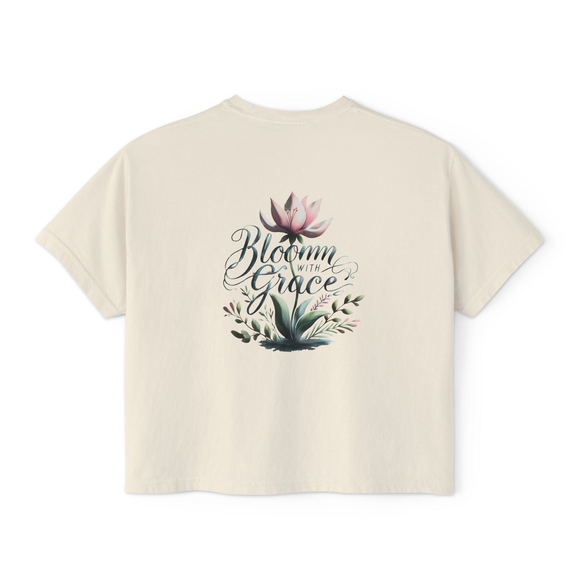 Womens boxy T-shirt with "Bloom with Grace" floral graphic, casual summer top.