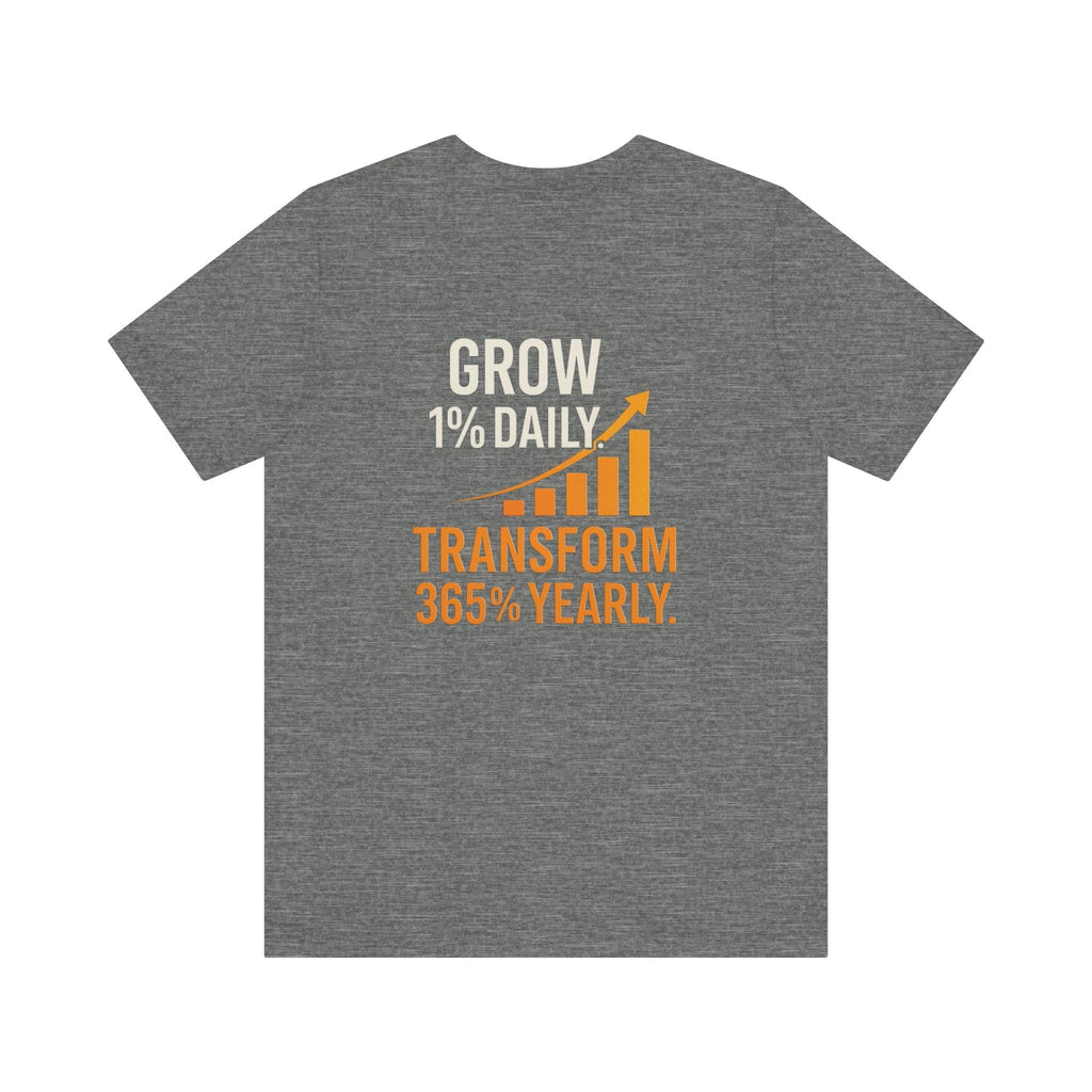 Unisex gray motivational growth t-shirt with "Grow 1% Daily, Transform 365% Yearly" graphic, breathable cotton short sleeve shirt for personal growth and entrepreneur gift