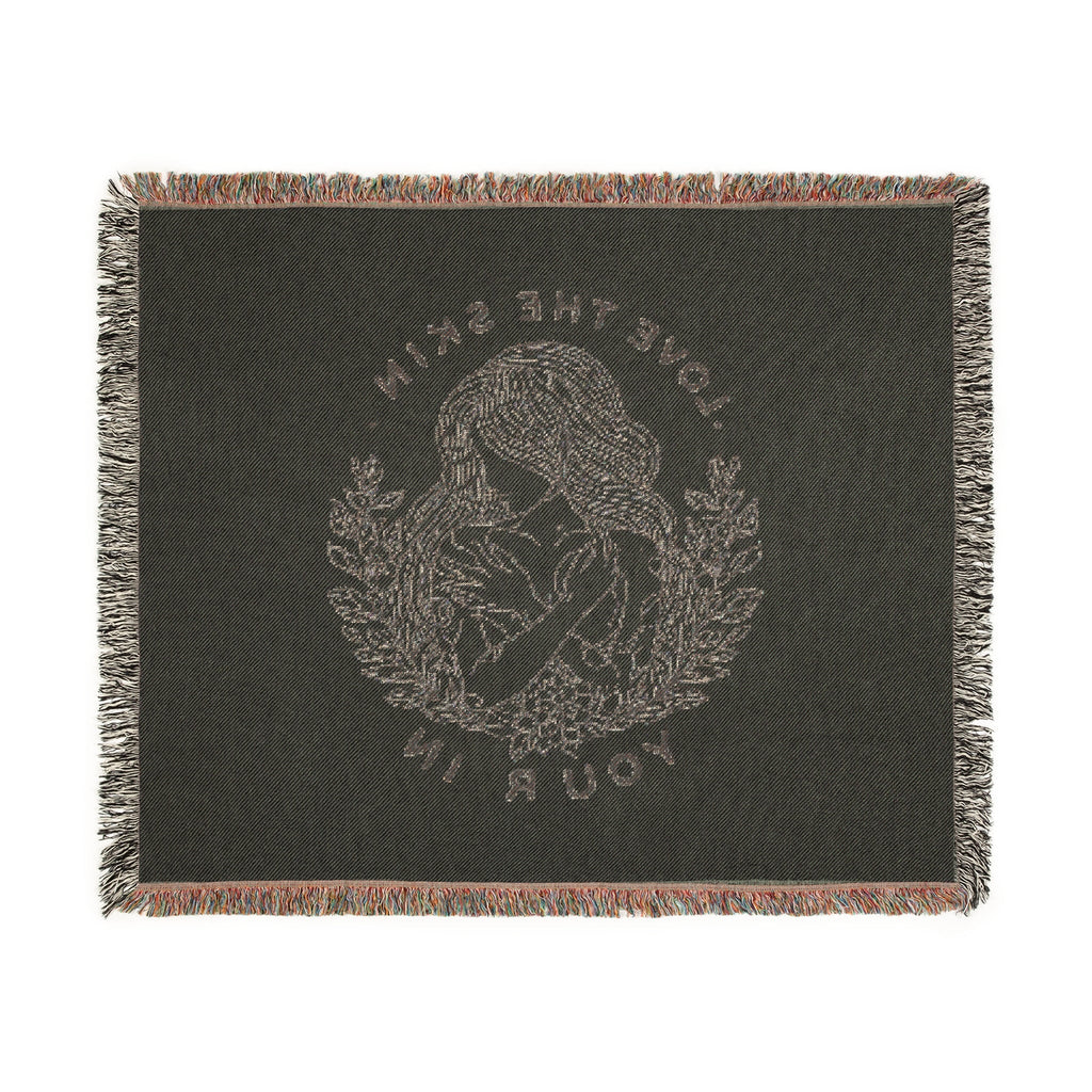Serene Nature Woven Blanket with line art design and colorful fringed edges.