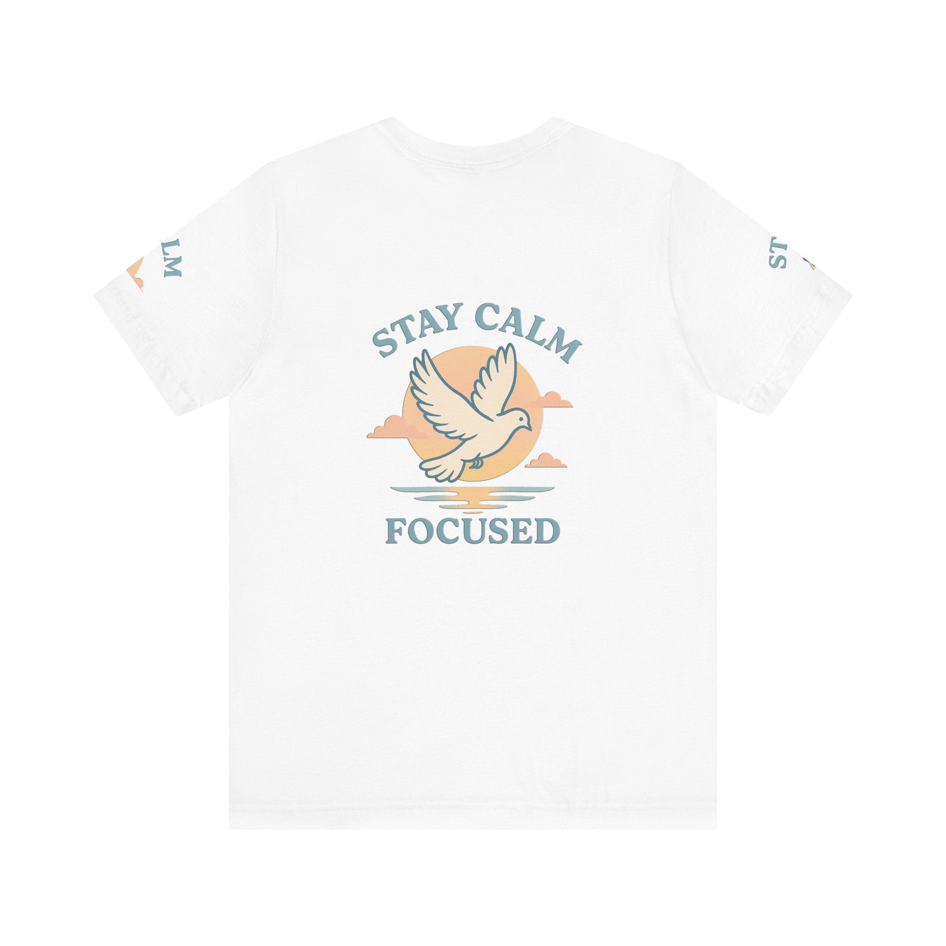 White unisex t-shirt with "Stay Calm Focused" text and dove graphic against a sunset background.