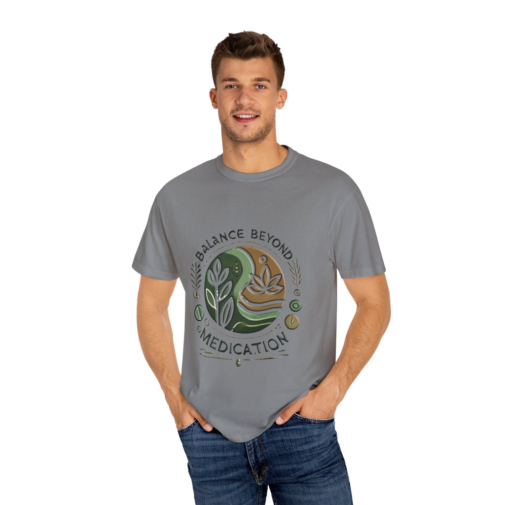 Unisex garment-dyed t-shirt with "Balance Beyond Medication" print, model wearing gray.