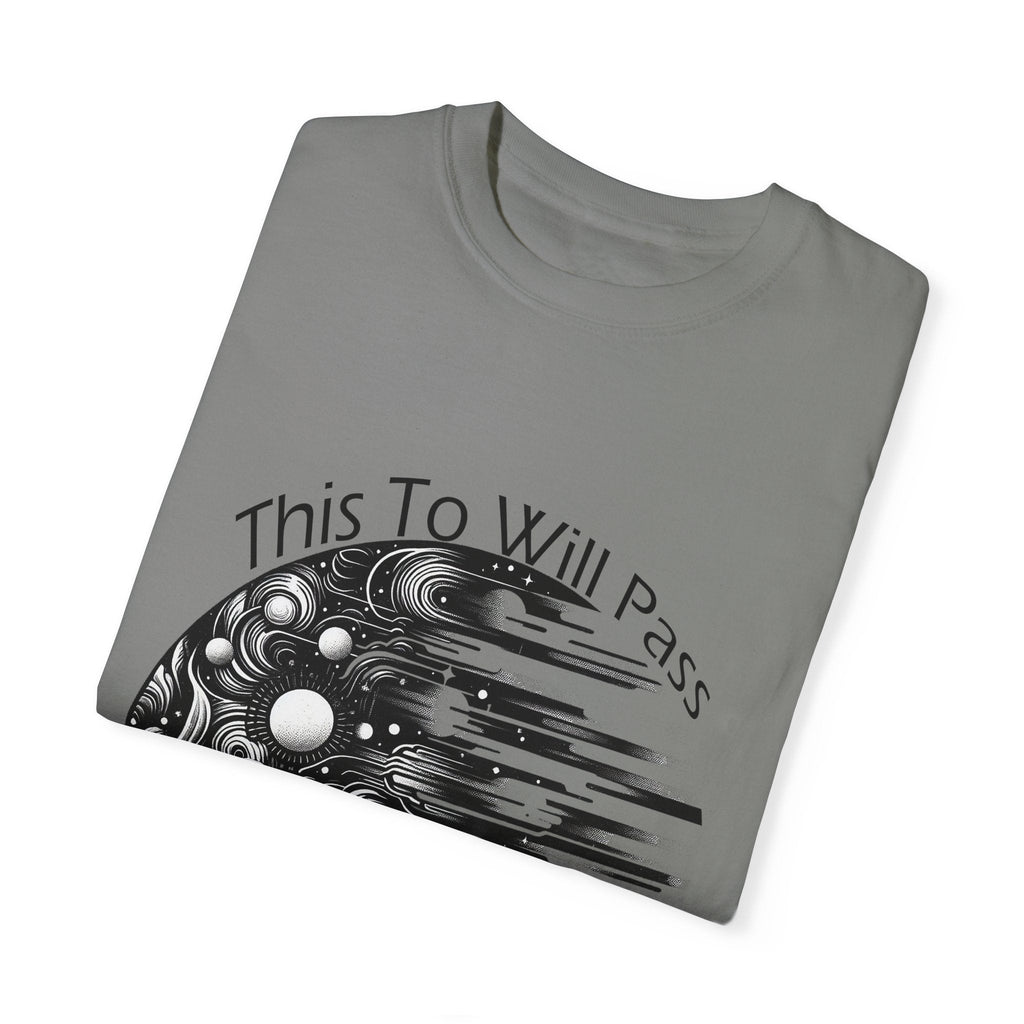 Unisex Garment-Dyed T-Shirt with "This Too Will Pass" design folded.