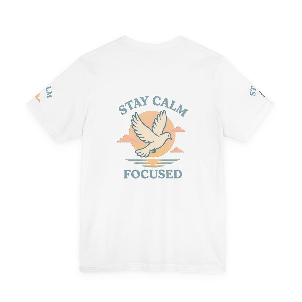 White unisex t-shirt with "Stay Calm Focused" text and dove graphic on the back, made from soft breathable cotton for everyday wear.