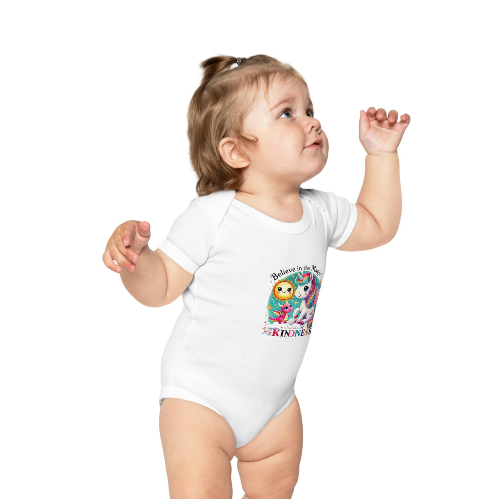 Baby wearing "Believe in the Magic of Kindness" combed cotton bodysuit.