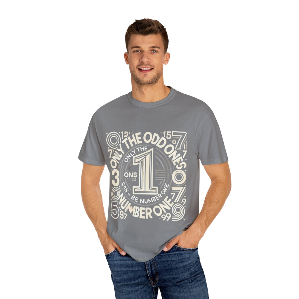 Unisex garment-dyed T-shirt with "Only the Odd Ones Can Be Number One" design, worn by a model, offering a relaxed and stylish fit.