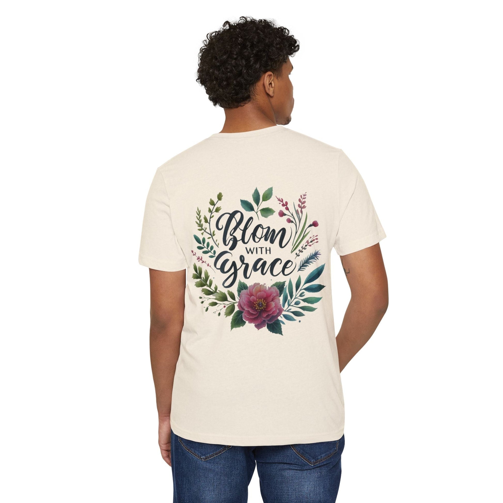 Eco-friendly t-shirt with "Bloom with Grace" floral design, made from organic cotton and recycled polyester.