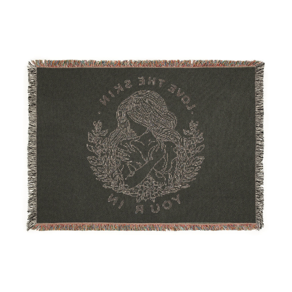 Serene Nature Woven Blanket with nature-inspired line art and colorful fringed edges, made from 100% cotton for cozy home décor.