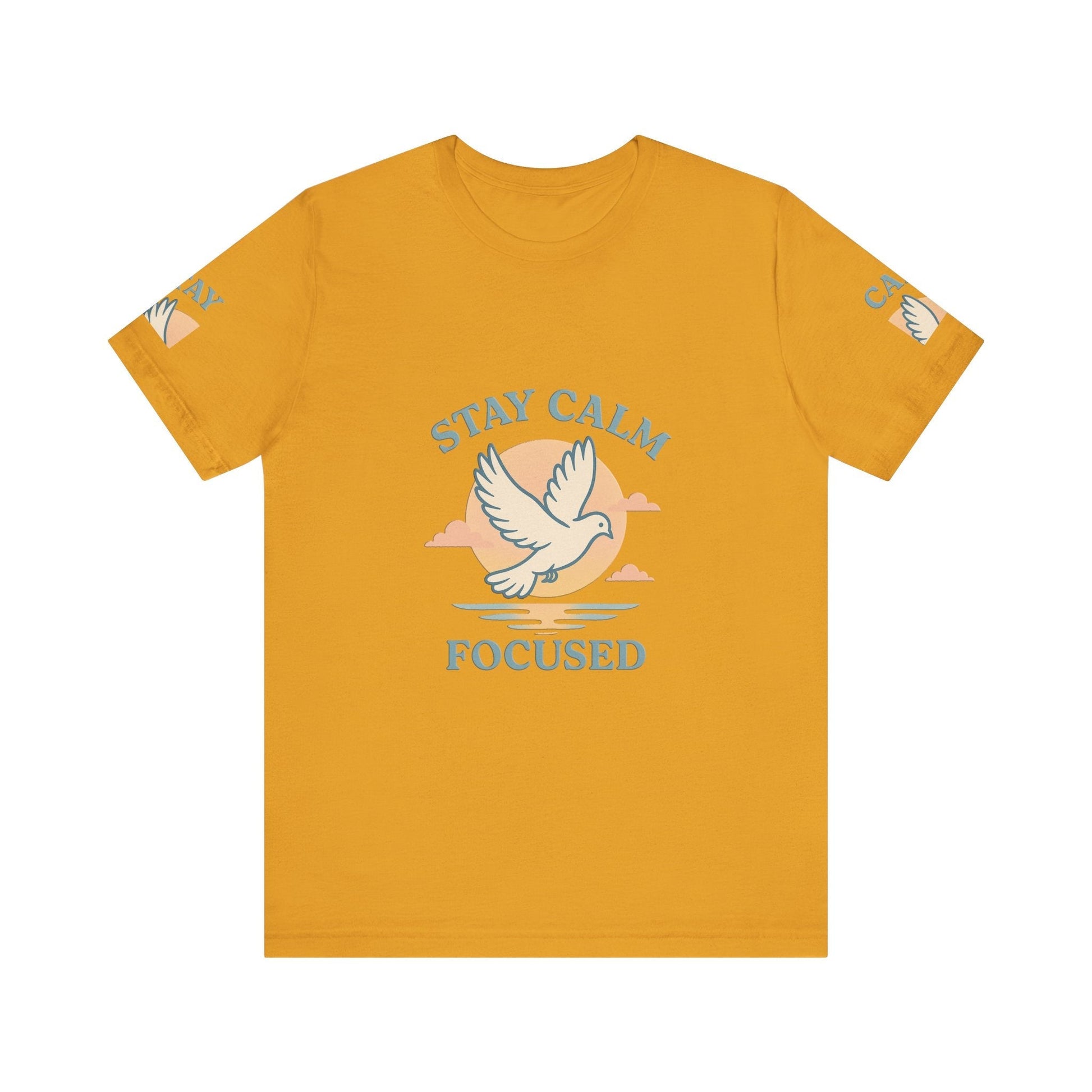 Mustard yellow unisexT-shirt  with "Stay Calm Focused" text and white dove graphic, soft breathable cotton shirt for relaxation and motivation.
