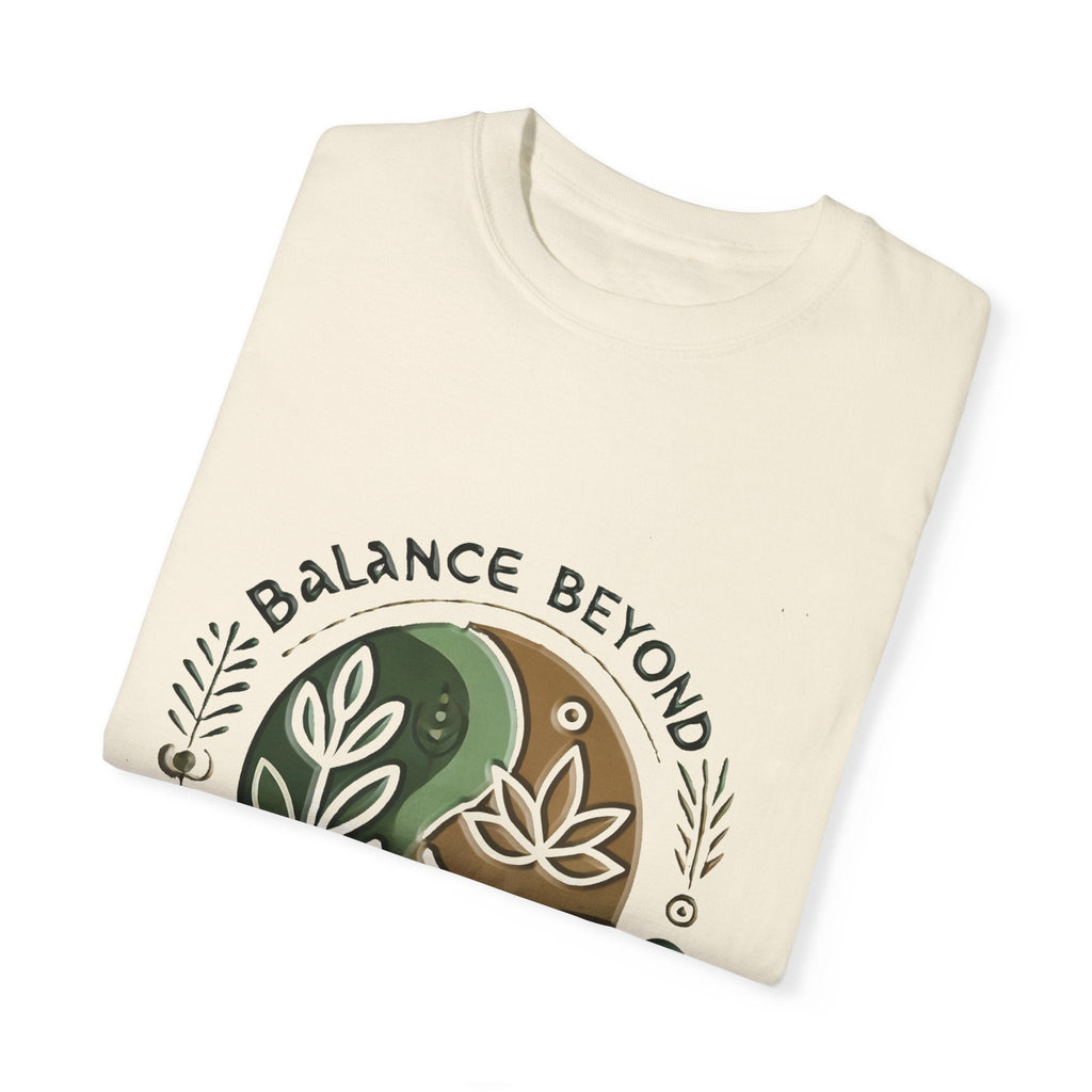 Balance Beyond Medication Unisex Garment-Dyed T-Shirt folded, featuring a nature-inspired design on soft fabric.