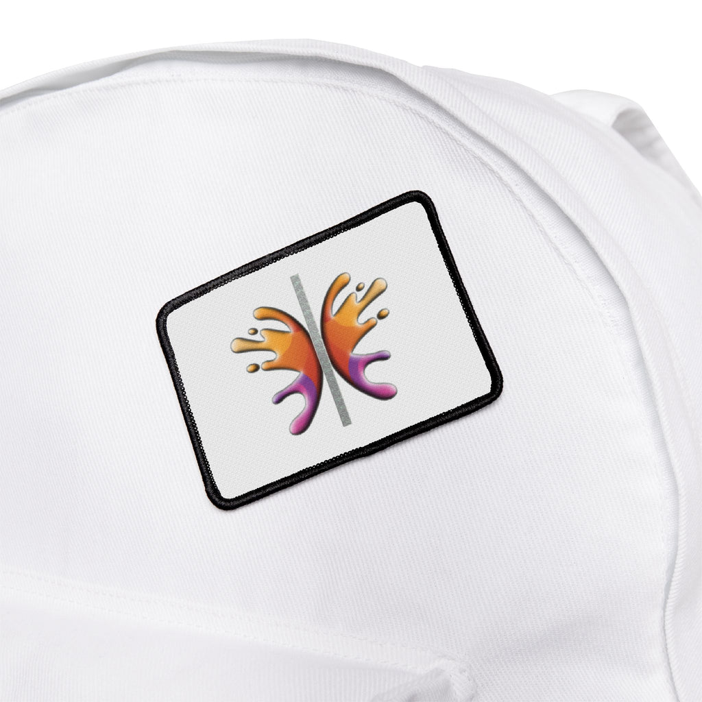 White iron-on patch with a colorful abstract design featuring black edges, perfect for personalizing apparel and gear.