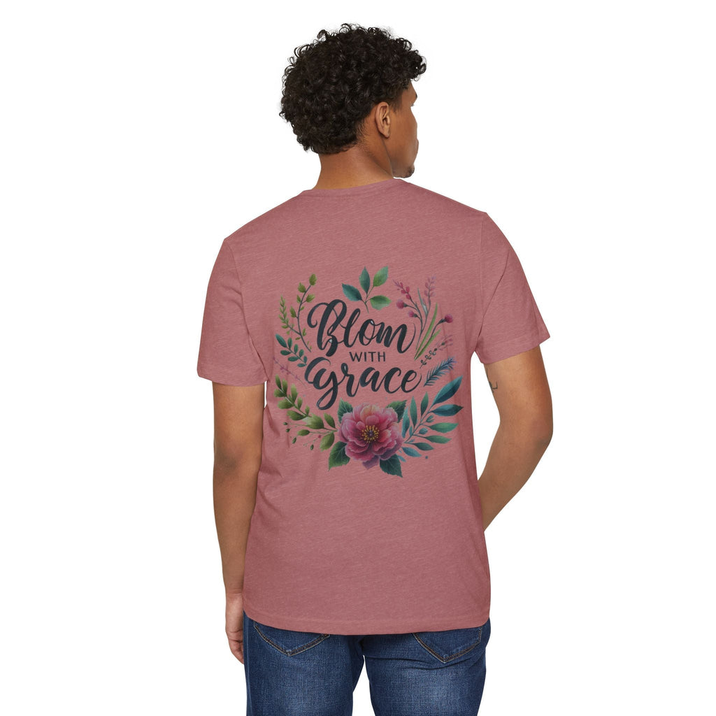 Eco-friendly organic T-shirt with floral design and "Bloom with Grace" text, worn by a person.