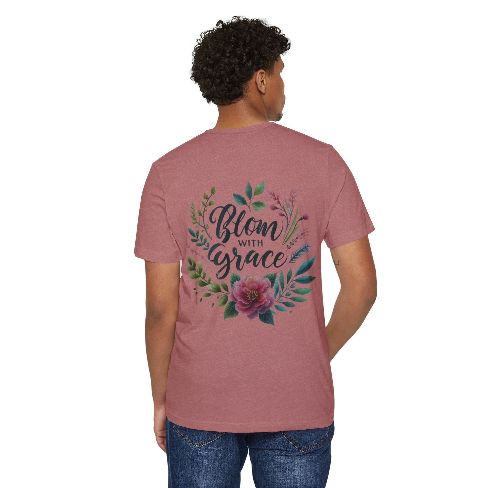 Eco-friendly organic T-shirt with floral design and "Bloom with Grace" text, worn by a person.