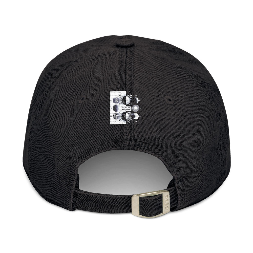 Cosmic embroidered denim hat with vintage pigment-dyed finish and adjustable strap.
