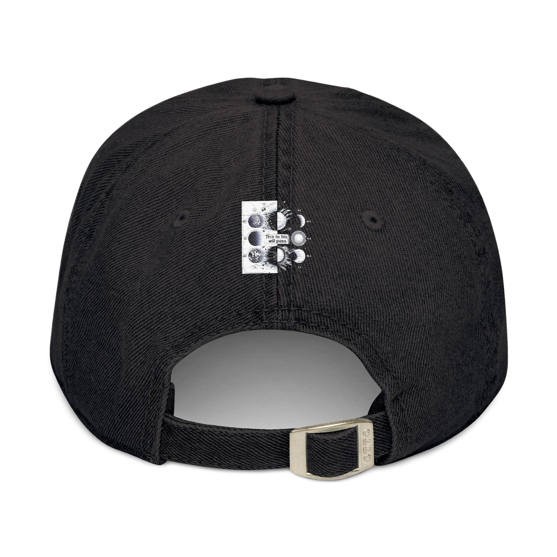 Cosmic embroidered denim hat with vintage pigment-dyed finish and adjustable strap.