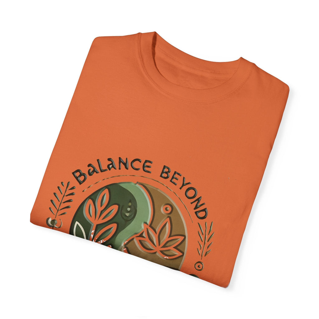 Unisex garment-dyed t-shirt with "Balance Beyond Medication" design, folded, soft orange color.